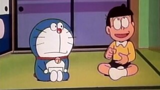 Nobita: Quick...save me...I can't hold on any longer...