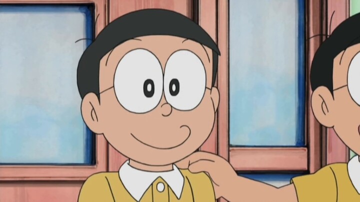 Watch carefully, when the blue fat man hit Nobita's head with a hammer, one Nobita instantly turned 