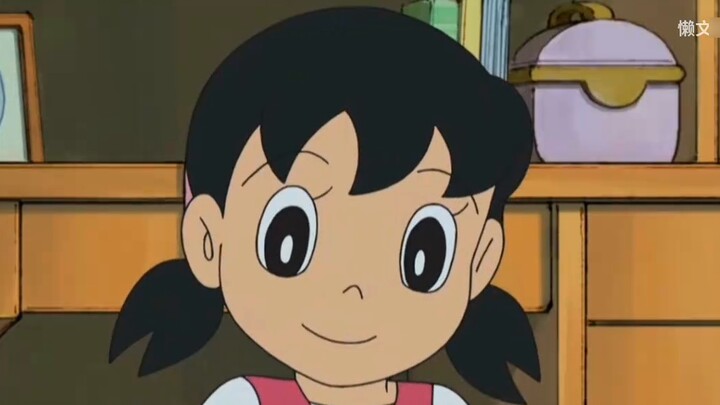 Doraemon: Nobita pretends to be a god to help people make wishes, so that he can study all night lon