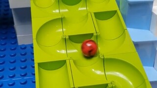 In a two-ball game, you really can't predict which ball will arrive first!