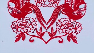 Mother's paper-cutting of birdsong and flowers