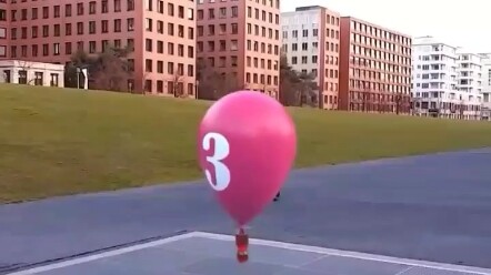 Chemical reactions lift the balloon into the sky, then unleash a rainbow shower as it descends.