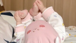 Precious footage of human babies taming tiny feet