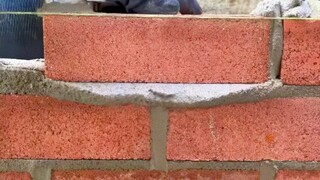 Why are the bricks in a brick wall staggered?