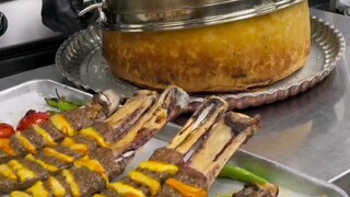 A big pot next to the exquisite beef ribs—guess what's inside?