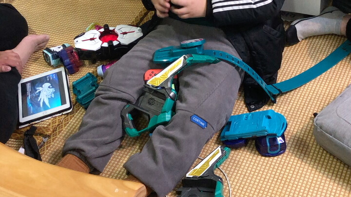 My little brother plays with Kamen Rider belt