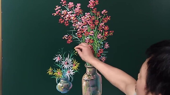 Blackboard drawing with chalk