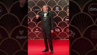 الفنان احمد عبدالعزيز وزوجته دينا شرف الدين على السجادة الحمراء فى مهرجان القاهرة للدراما 2022