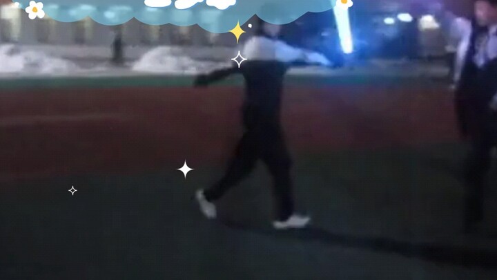 A middle school boy fighting in the playground after class in the evening.