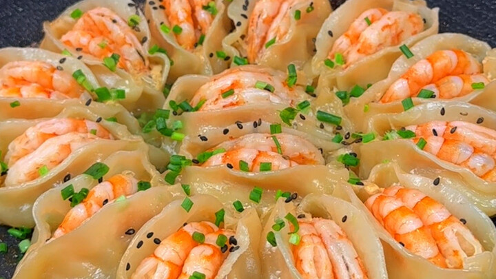 Oh my god, these smiling shrimp dumplings are crispy on the outside and tender on the inside—each bi