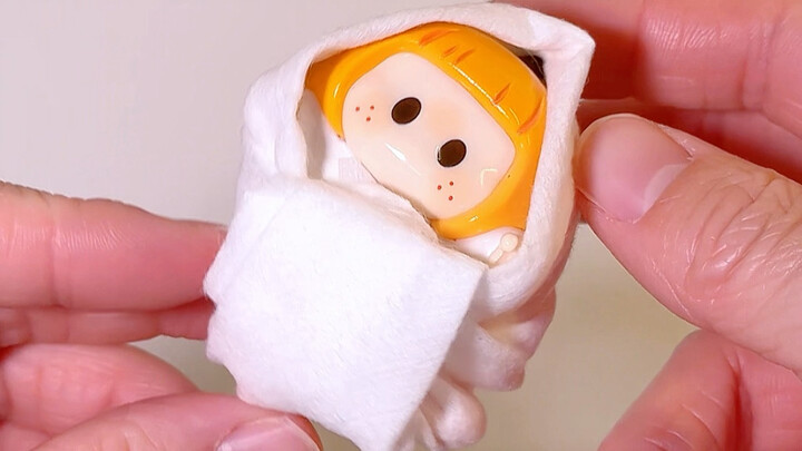 Two ways to wrap a baby—which one do you prefer?