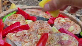 Membuat api dan memanggang ikan