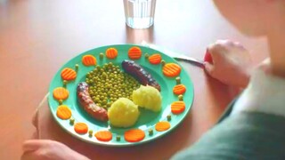 The girl has severe obsessive-compulsive disorder. The food must be placed symmetrically and the mea