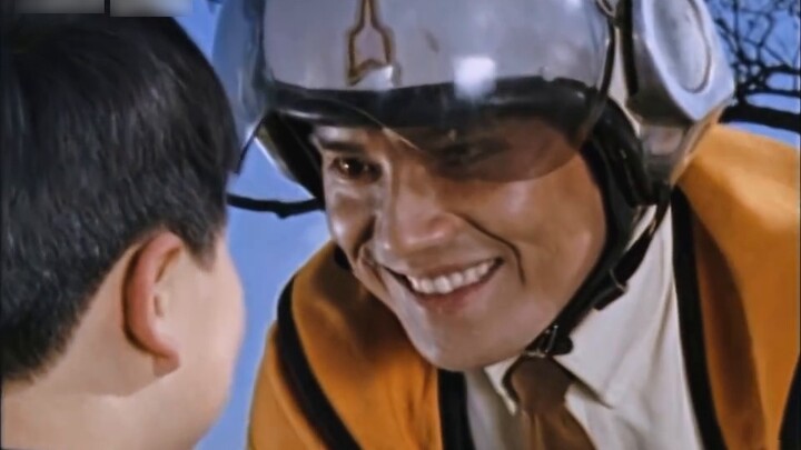 The little boy gave Hayata a transformation device