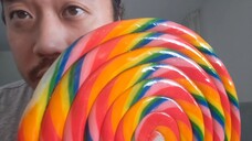 ASMR EATING LARGEST RAINBOW LOLLIPOP & AIR TRACING ENGLISH ALPHABET
