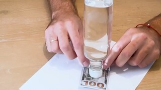 Can you remove the money from the water bottle without touching it?