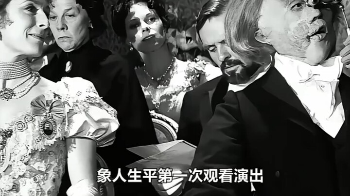 He’s an elephant man in a circus—he can only sleep sitting up, or he’ll die! Watch the critically ac