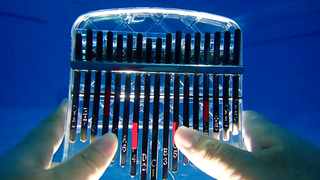 Playing "Big Fish & Begonia" 5m under Water with a Kalimba