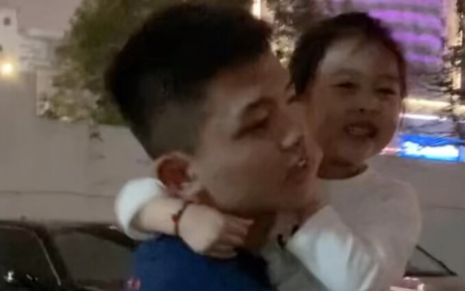 The older brother who always wanted a younger brother now can’t put his little sister down.