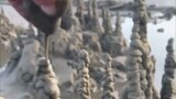 [Giải nén] Đây có phải là việc gom cát thành tháp không?