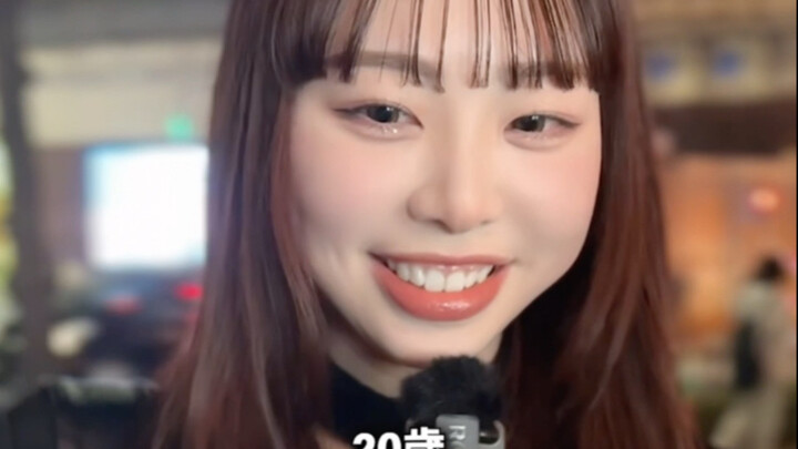 Street interview: Guess the age of the cherry blossom girl