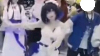 Hilarious—wearing an even more elegant gown than last time, she continues to dance casually.