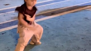 Little Karami dancing in the square is completely intoxicated by the rhythm