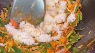 Is fried rice with meat, seafood, eggs and sausage the ceiling?