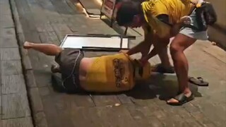 Two delivery drivers got into a street fight, and passersby stepped in to break it up.