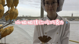 The girl at the Cologne Chocolate Museum in Germany invites you to eat unlimited KitKats