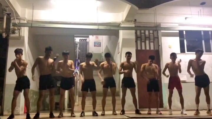 Help! A bunch of shirtless, six-pack–chasing athletes are doing hip-swaying dance moves to “Piggy He