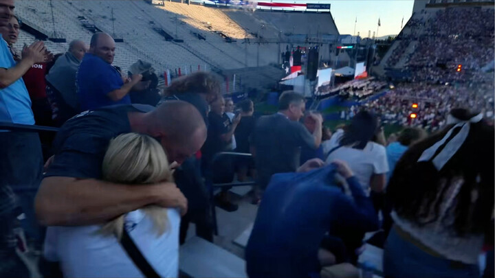 Injured by an out-of-control firework while watching a show at a U.S. university stadium.
