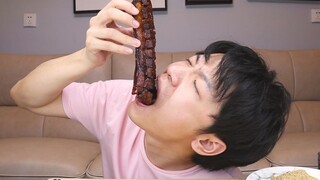 Is this the best crispy pork belly ever? The guy's mouth was full of oil and he was so happy!