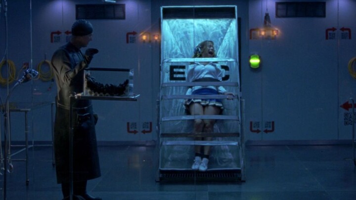 The Hunting Association displays its wealthy patrons’ prey in a glass case, and the crowd below bids