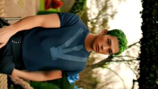 Green haired guy.