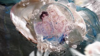 เปลือกหอยและแก้วขาสูงทรายไหล