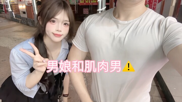 A cross-dressing man and a muscular guy are actually outdoors…