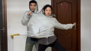 Two people using two hands