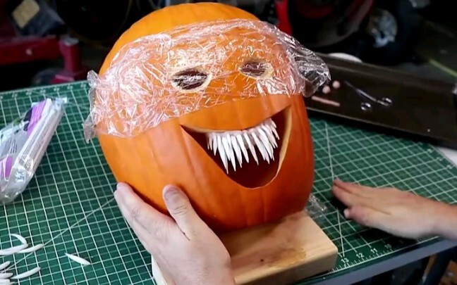Make a Halloween mask out of a pumpkin. Put it on and head out—anyone who sees you will bolt!