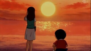 cùng người đẹp ngắm biển thế này mê phải biết nobita nhỉ