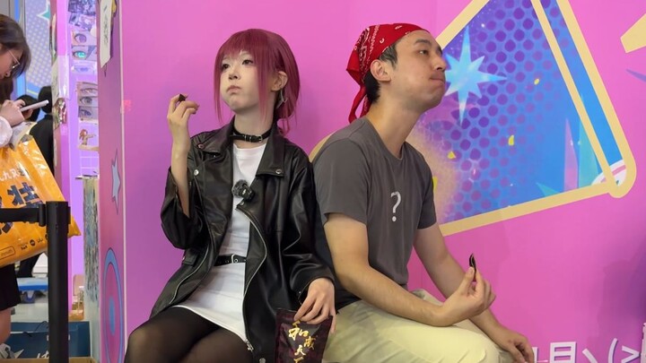 Two people chewing large fruits after BW
