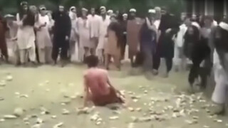 Real footage of a prisoner being stoned to death in Iran in 1992 for adultery