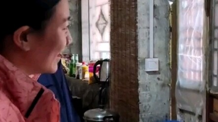 As a kid, I often did this—peeking at the outside world through the door curtain.