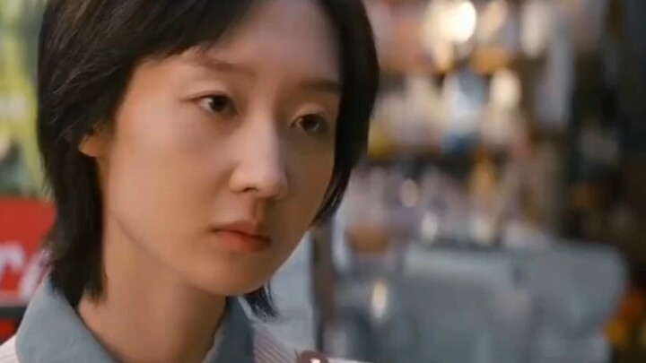 I really love how this shop assistant looks utterly drained and listless at work—so relatable to the