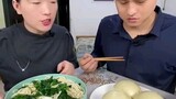 husband and wife eating