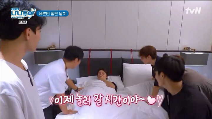 As the handsome beauty opens their eyes, a group of men are gathered around my bedside?