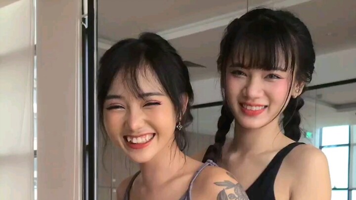 Cute twins go all out at the gym