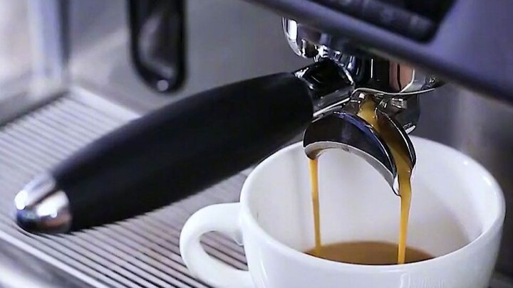 The guy has symmetrical obsessions—his coffee machine even spits out two cups at once!