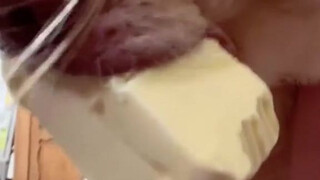 The dog stole some butter and won't let go—neither gentle coaxing nor firm insistence works. I guess