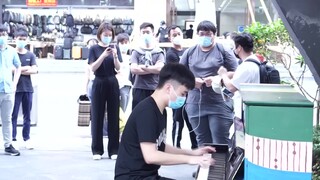 Piano version of "Butterfly" by a boy in the street